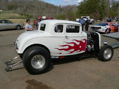 white coupe drag car